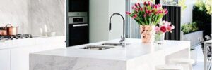 A waterfall island in a new kitchen